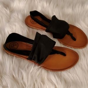 Yoga style sling sandals.